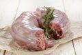 Raw turkey neck with rosemary Royalty Free Stock Photo