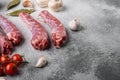 Raw turkey neck without skin, on gray stone table background, with copy space for text Royalty Free Stock Photo