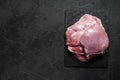 Raw Turkey thigh fillet. Farm eco meat.  Dark background. Top view. Space for text Royalty Free Stock Photo
