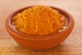 Raw turmeric paste in a bowl Royalty Free Stock Photo