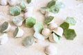 Raw two-tone white and green dumplings with spinach, cheese or meat on a table