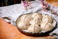 Raw unbaked homemade Easter traditional hot cross buns