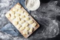 Raw uncooked homemade potato gnocchi with flour on cutting board. Royalty Free Stock Photo