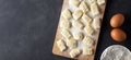 Raw uncooked homemade potato gnocchi with flour on cutting board. Royalty Free Stock Photo