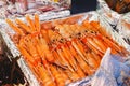 Raw uncooked large red shrimp, lobster Cigala for sale at fish market. Sea food market. Stock photo large red shrimps,