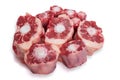 Raw uncooked ox tail portions on white