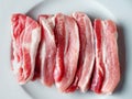 Raw uncooked pork belly slices. Royalty Free Stock Photo