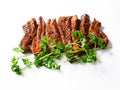 Raw uncooked pork belly slices marinated with Korean style souse and herbs and fresh coriander leafs on a white surface, Meat