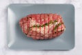 Raw Uncooked Pork, Rolled Meat with Herbs and Seasoning Royalty Free Stock Photo