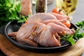 Raw uncooked quail. Ingredients for cooking healthy meat dinner