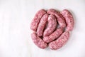 Raw uncooked sausages salsiccia nodi Royalty Free Stock Photo