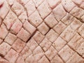 Raw uncooked seasoned scored pork belly skin background Royalty Free Stock Photo