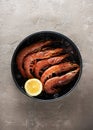 Raw uncooked shrimp prawns in bowl on ice Royalty Free Stock Photo