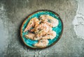 Raw uncooked tiger prawns on chipped ice, copy space Royalty Free Stock Photo