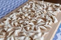 Raw, uncooked triangle shaped manti. traditional turkish food. turkish ravioli