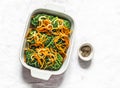 Raw uncooked vegetarian delicious lunch - roasted savoy cabbage stuffed spicy bulgur. Savoy cabbage bulgur rolls in baking pan on Royalty Free Stock Photo
