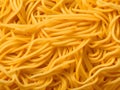 raw uncooked yellow pasta background