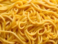 raw uncooked yellow pasta background