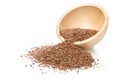 Raw, unprocessed linseed or flax seed in wooden bowl