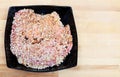 Raw veal schnitzel in breadcrumbs in bowl Royalty Free Stock Photo