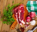 Raw veal steaks with herbs, vegetables and condiments Royalty Free Stock Photo