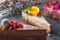 Raw vegan cakes with fruit and seeds, decorated with flower, product photography for patisserie Royalty Free Stock Photo