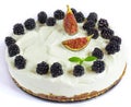 Raw vegan cashew nutty coconut cheesecake with blackberry