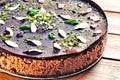 Raw vegan chocolate cake decorated with nature Royalty Free Stock Photo