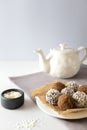 Raw vegan energy balls with dried fruit and coconut. Royalty Free Stock Photo