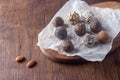 Raw vegan healthy energy balls with oatmeal, chia seed, coconut flakes, cocoa, almond and dried fruits Royalty Free Stock Photo