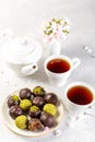 Homemade sweets with tea on a light concrete background Royalty Free Stock Photo