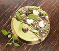 Raw vegan mint cake with nuts, decorated with raw chocolate hea