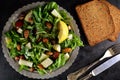 Spinach and Avocado Salad with Arugula, Pear, and Almonds