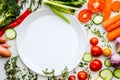 Raw vegetable platter, flat lay style, blank white table around for label or info Royalty Free Stock Photo