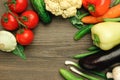 Raw vegetables on a wooden surface