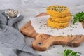 Raw veggie burger with chickpeas, vegetables and parsley leaves on kitchen countertop Royalty Free Stock Photo