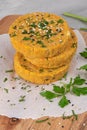 Raw veggie burger with chickpeas, vegetables and parsley leaves on kitchen countertop Royalty Free Stock Photo