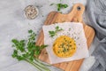 Raw veggie burger with chickpeas, vegetables and parsley leaves on kitchen countertop Royalty Free Stock Photo