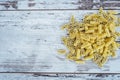 Raw vehicle-shaped pasta in pile on wooden table Royalty Free Stock Photo