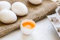 Raw white farm chicken eggs with egg yolk Royalty Free Stock Photo