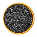 Raw whole black urad beans in round bowl cutout Royalty Free Stock Photo