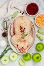 Raw whole duck for baking with apples, cranberries, sauerkraut and spices Royalty Free Stock Photo