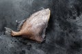 Raw whole fish John Dory. Black background. Top view. Copy space Royalty Free Stock Photo