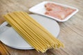 Raw wholemeal spaghetti and smoked salmon Royalty Free Stock Photo