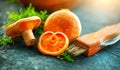 Raw wild Saffron milk cap mushrooms on dark old rustic background. Lactarius deliciosus, Rovellons, Niscalos mushroom Royalty Free Stock Photo