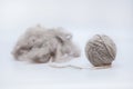 Raw wool yarn coiled into a ball Royalty Free Stock Photo