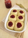 Raw yeast dough with lingonberry jam for baking sweet buns Royalty Free Stock Photo