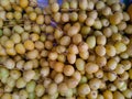 Raw yellow Dates, healthy fruit.Close up  Yellow Raw Fresh Dates in open market Royalty Free Stock Photo