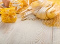 Raw yellow italian pasta pappardelle, fettuccine or tagliatelle Royalty Free Stock Photo