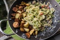 Zucchini noodles with roasted potatoes